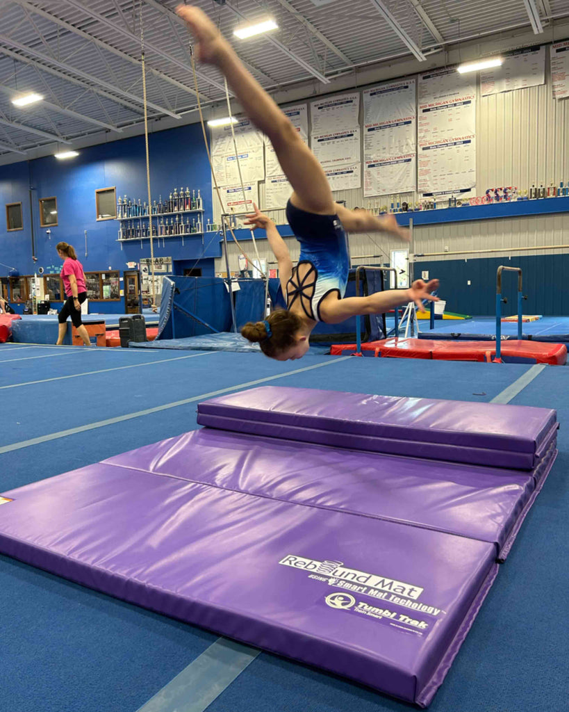 Understanding the Impact-Rebound Ratio in Gymnastics Mats and Its Effect on Athlete Performance